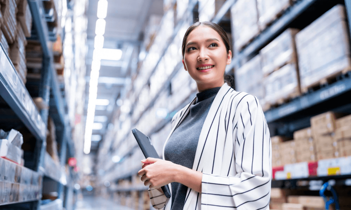Warehouse manager reviewing inventory